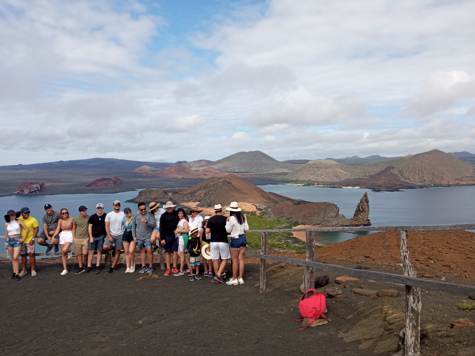 Group of tourists overlooking Pinnacle Rock at Bartolomé