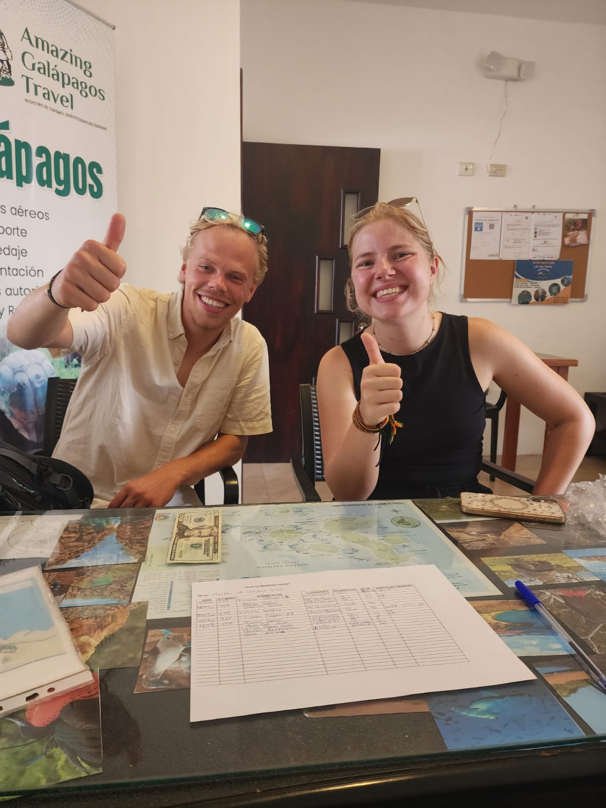 Happy clients at the Amazing Galápagos Travel office